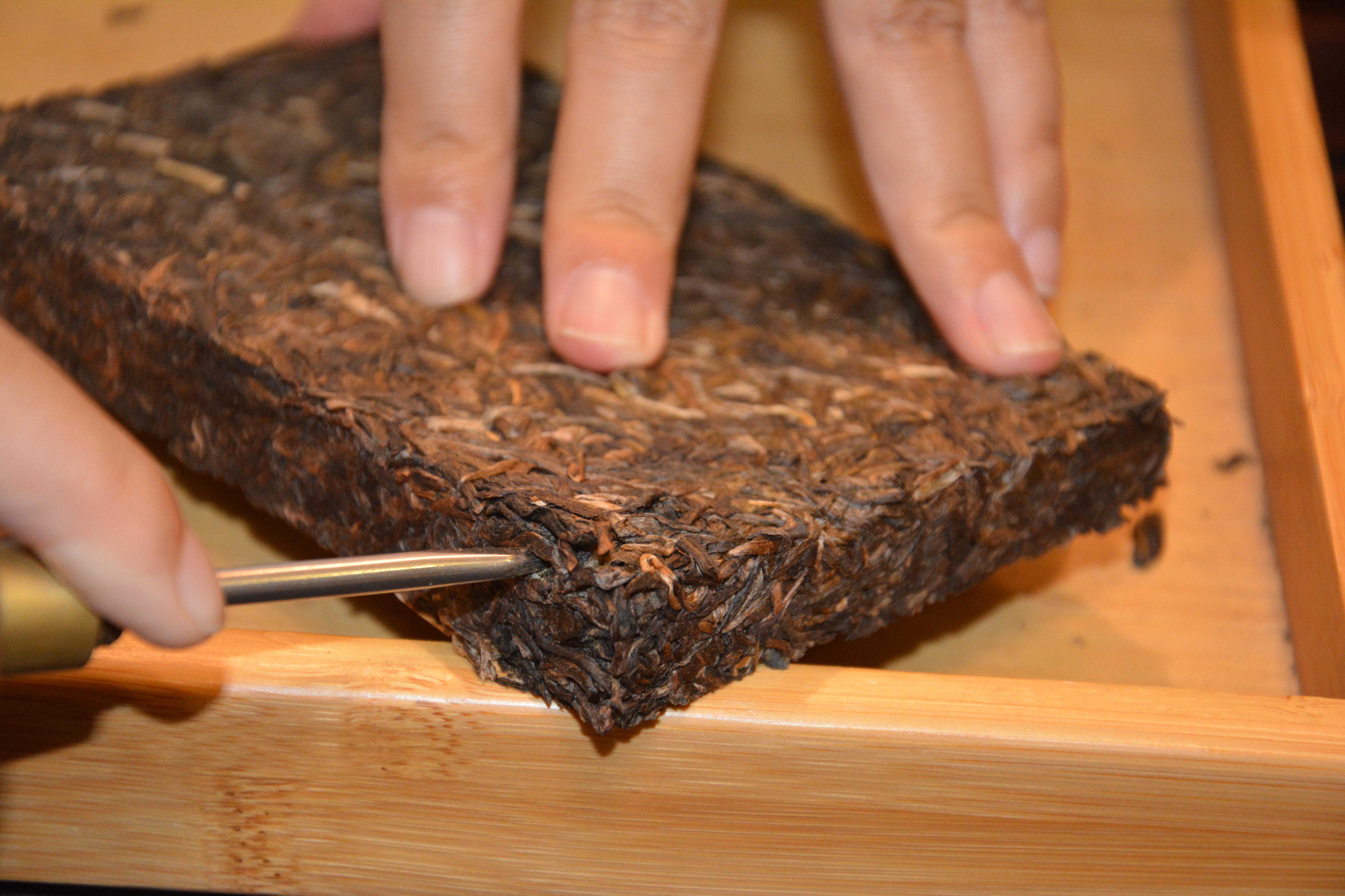 怎样完整地撬取茶叶